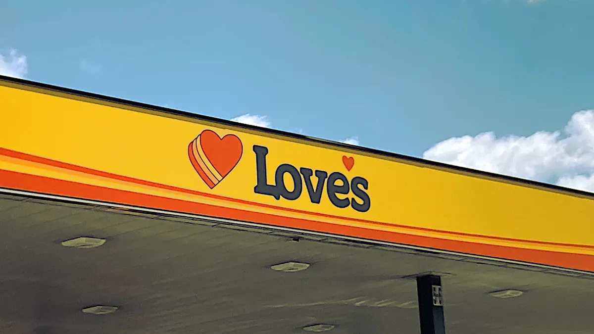 A photo of the canopy over the gas pumps at a gas station. It says "Love's."