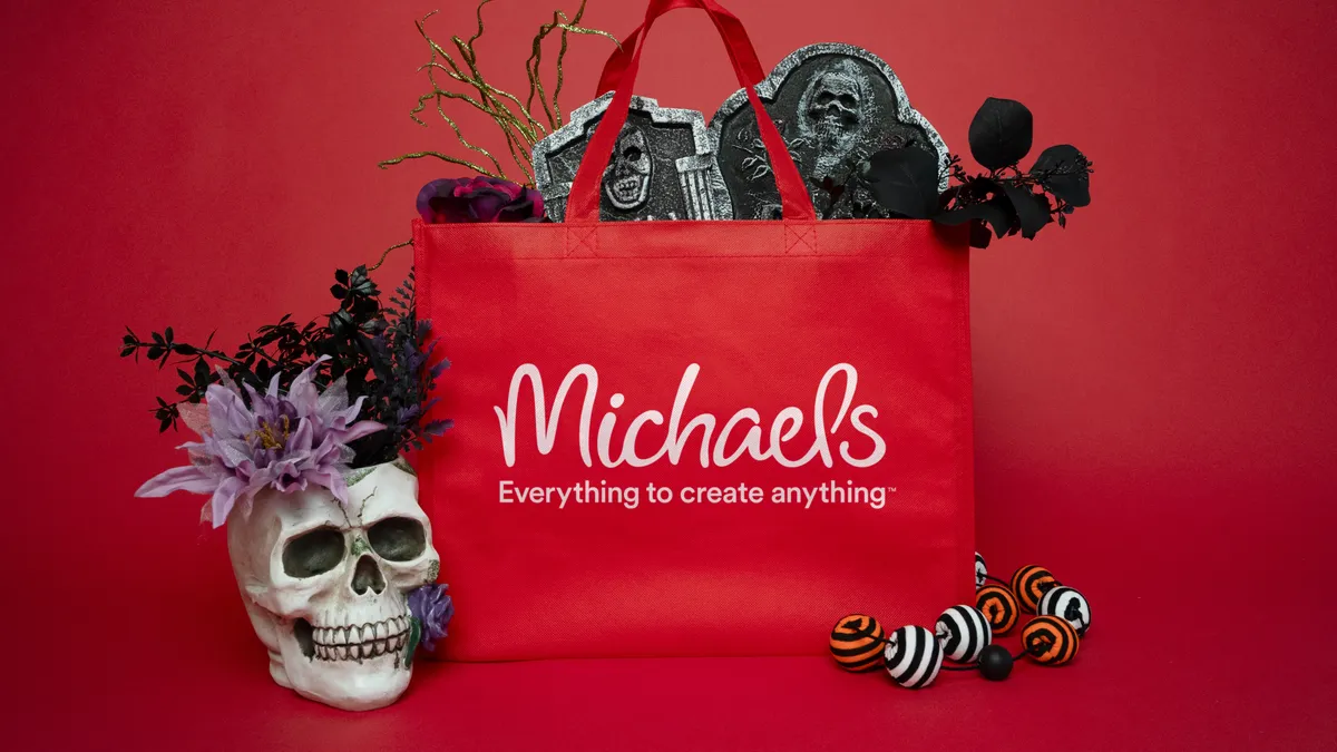 A Michaels shopping bag with Halloween-themed items