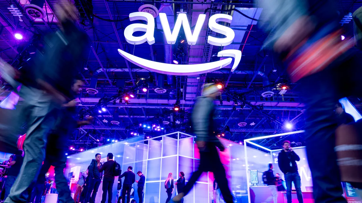 ttendees walk through an expo hall at AWS re:Invent 2023, a conference hosted by Amazon Web Services, at The Venetian Las Vegas on November 28, 2023 in Las Vegas, Nevada.