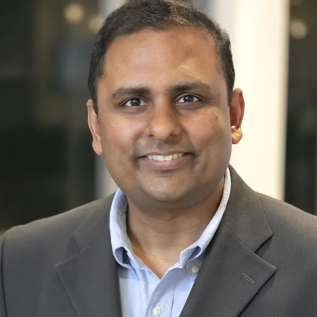 Headshot of Abishek Mittal, VP of Data and Operational Excellence at Wolters Kluwer