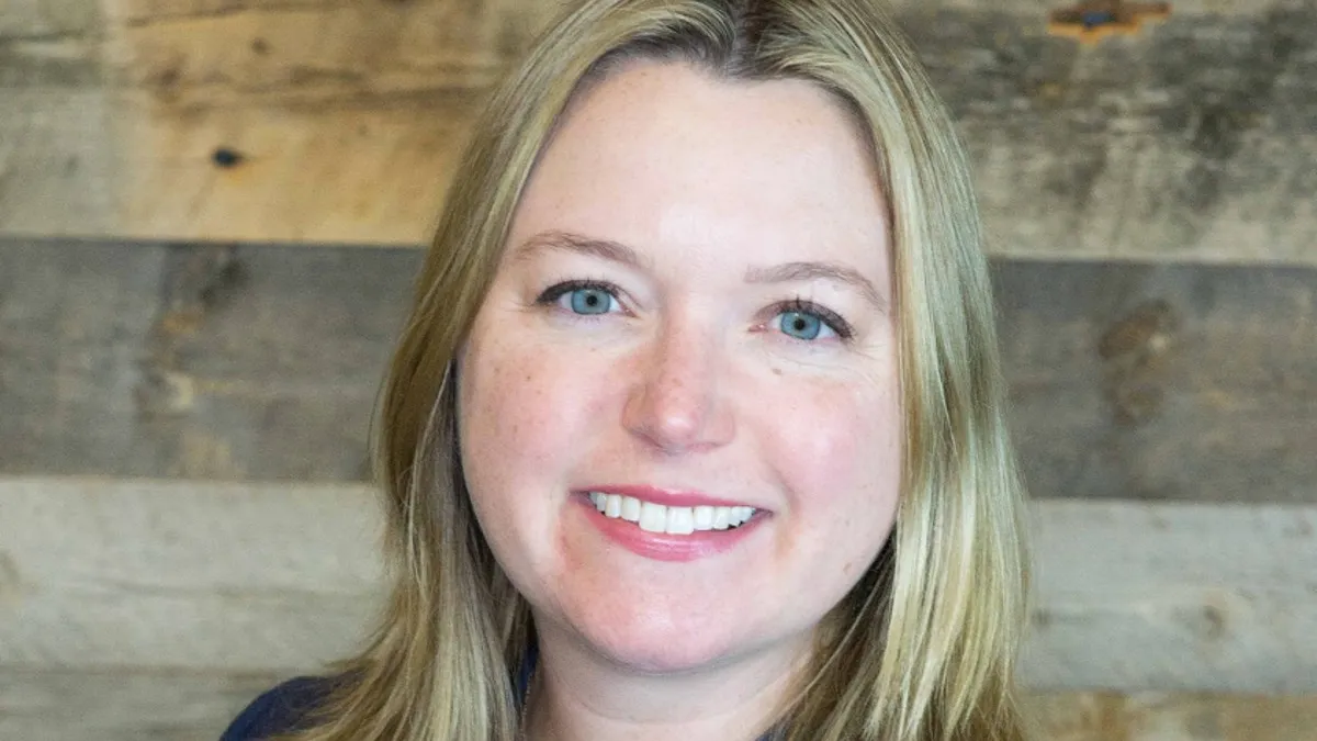 A photograph of Shannon Hennessy, CEO of Habit Burger