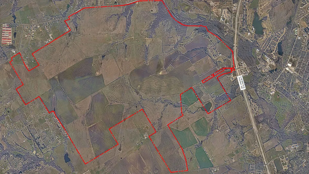 Aerial view of land where Minto plans to develop a mixed-use community.