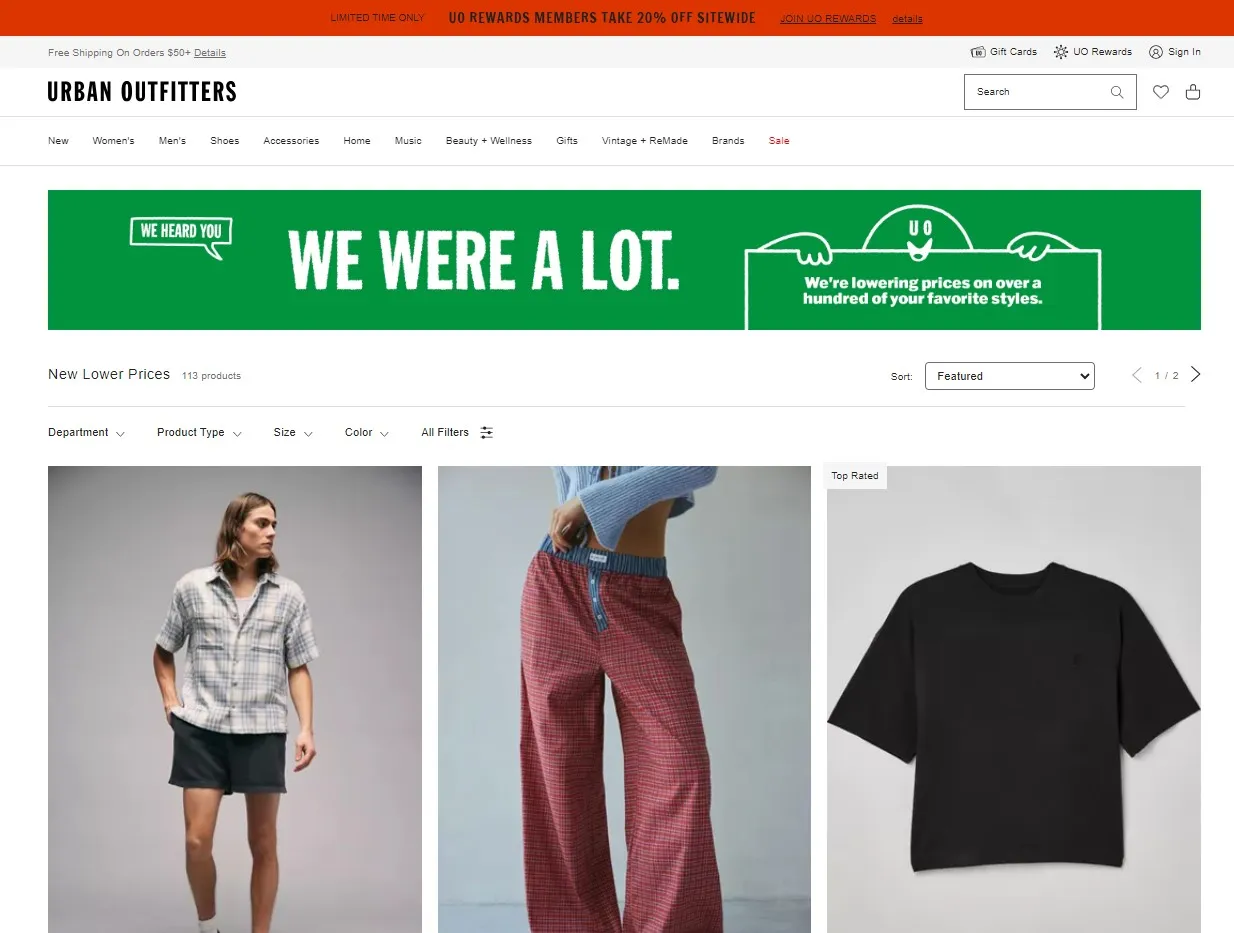 An October 2023 screenshot of the Urban Outfitters website shows a green banner at the top promoting product price drops.