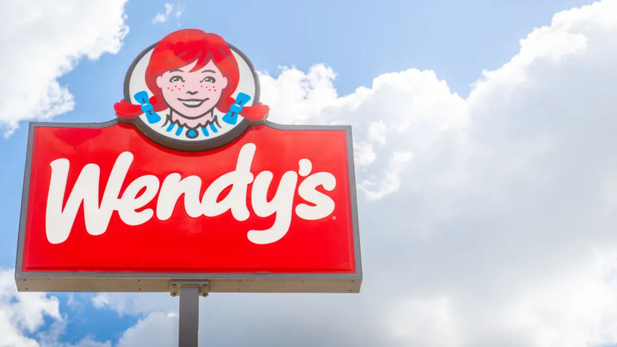The Wendy's logo displayed near a Wendy's restaurant on June 18, 2024 in Austin, Texas.