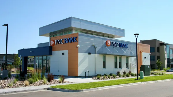 A PNC branch in Denver is shown, with "PNC Bank" signage on the exterior of the building.