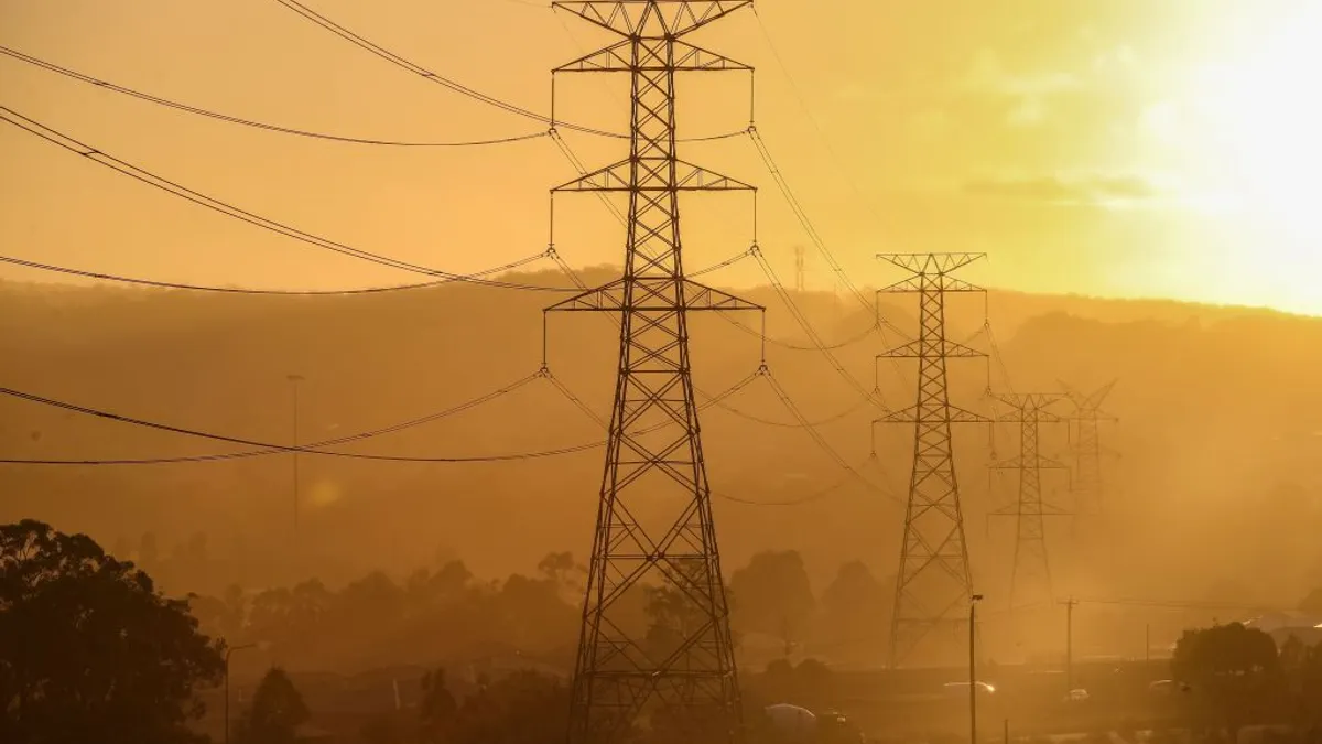 High voltage electricity transmission towers are shown at Cameron Park on May 08, 2024 in Lake Macquarie, Australia.