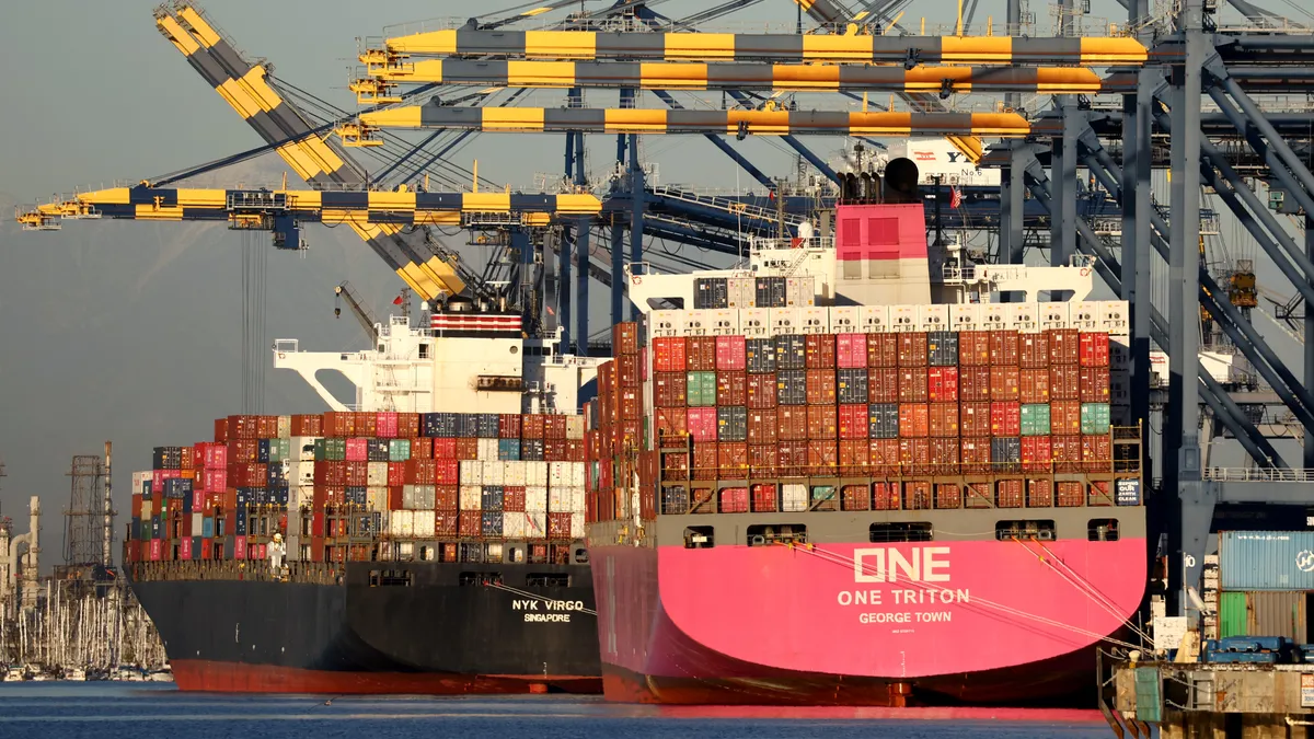 Container ships are docked with shipping containers at the Port of Los Angeles.