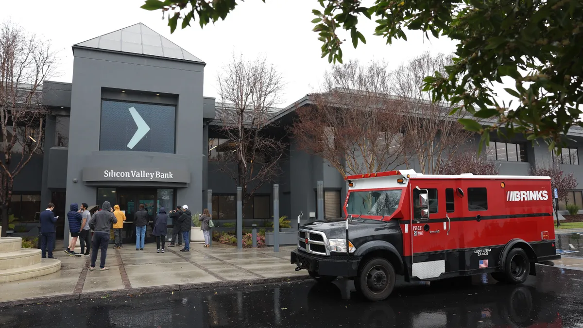 Shot of armored truck in front of SVB headquarters