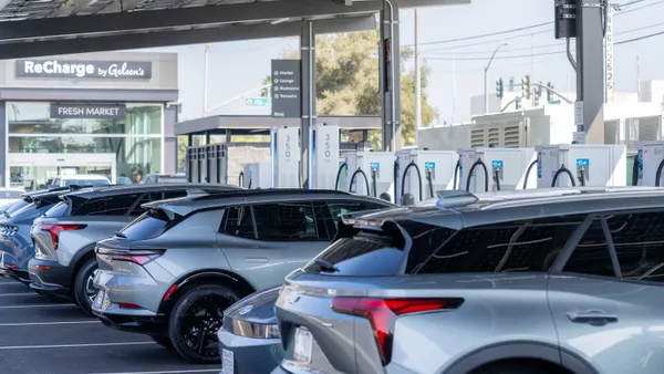 A photo of cars at an EV charging hub.