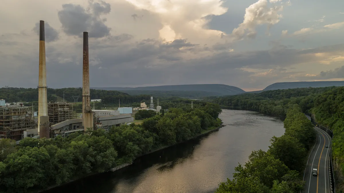 The power plant on the Delaware River, at the border between Pennsylvania and New Jersey, with the remote view on the Delaware Water Gap.