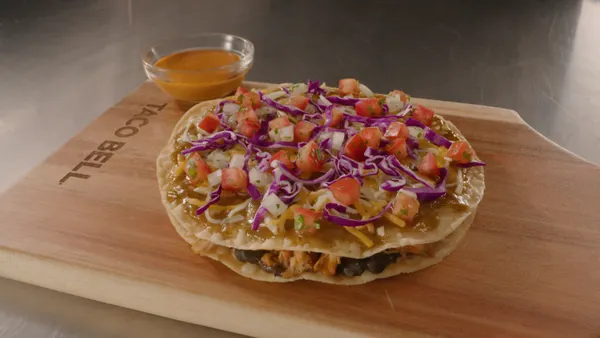 A Taco Bell Mexican Pizza with premium chicken