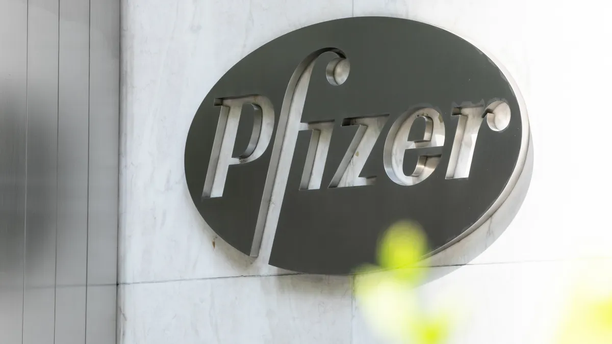 A Pfizer sign on a building.