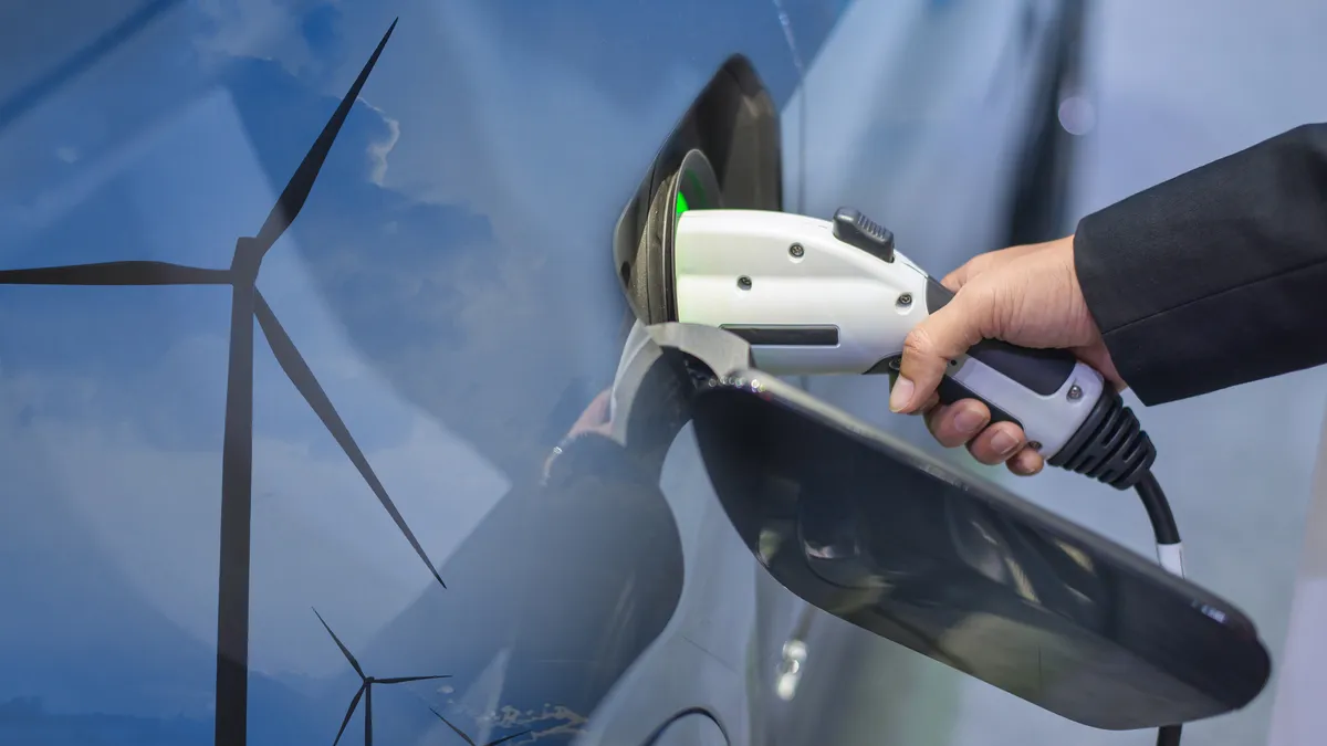 Double exposure of EV charging station for electric car