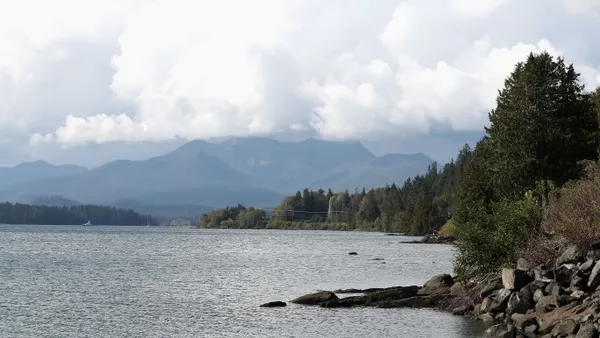 A panoramic view of mountains and the ocean near Haida Gwaii