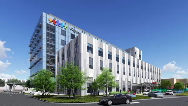 A rendering depicts a modern children's hospital exterior.