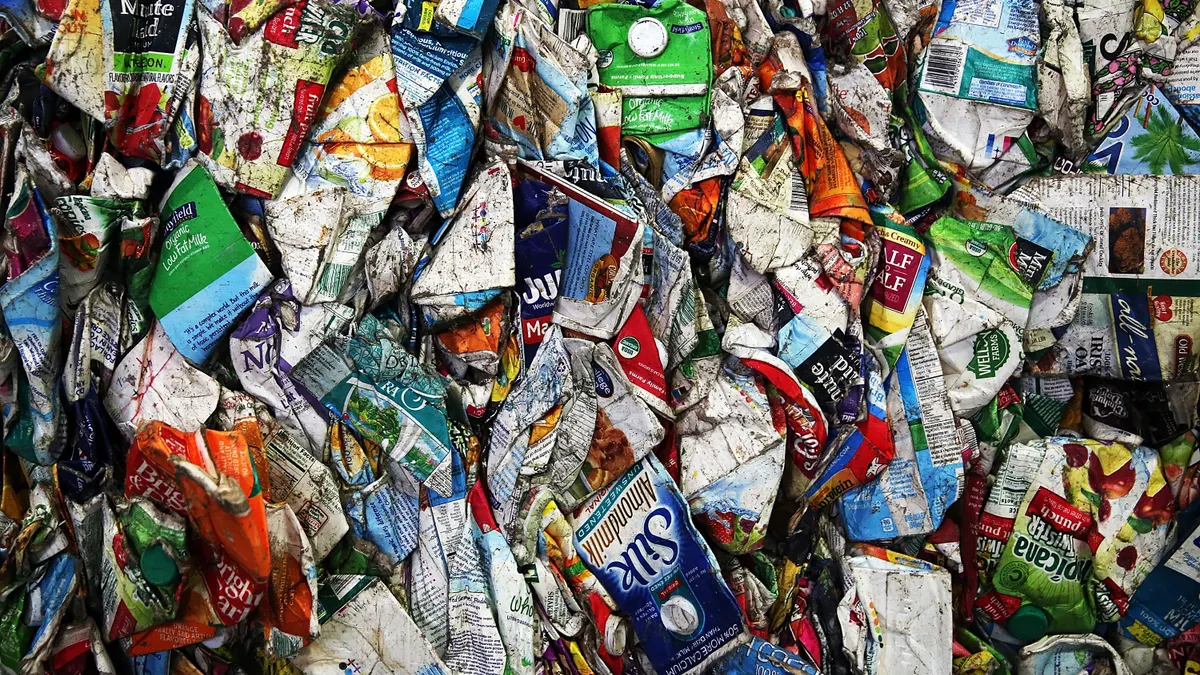 Recycled milk cartons are viewed at the Sims Municipal Recycling Facility on April 22, 2015 in New York City.