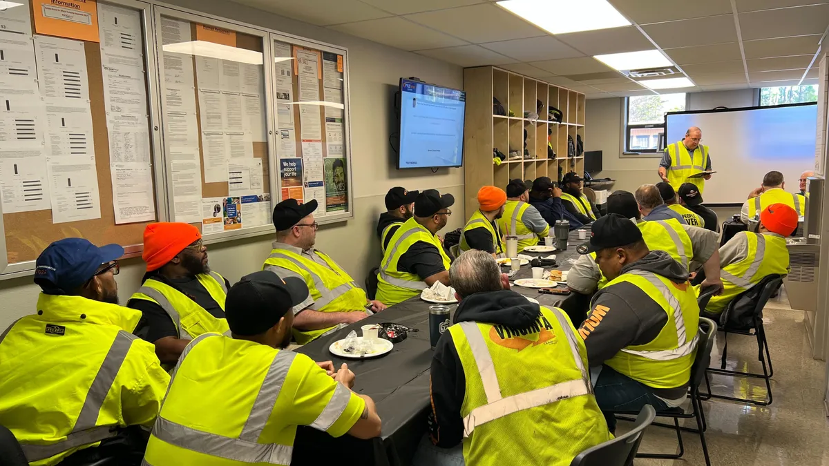 A. Duie Pyle drivers meet with the company's senior leadership during an employee breakfast and question-and-answer session at LTL carrier's relatively new terminal in Richmond, Virginia.