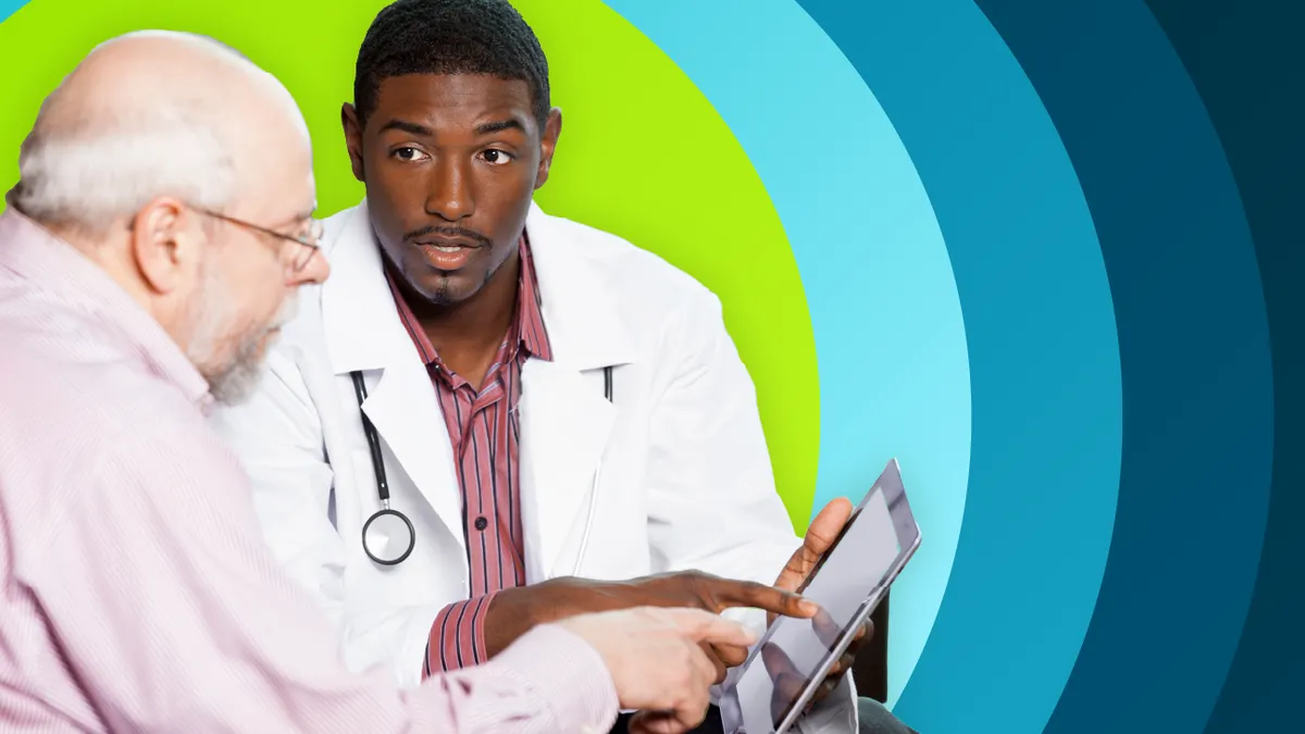 Medical professional showing patient information on digital tablet.