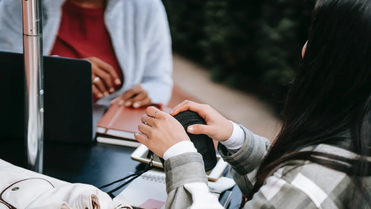 college students study together outside