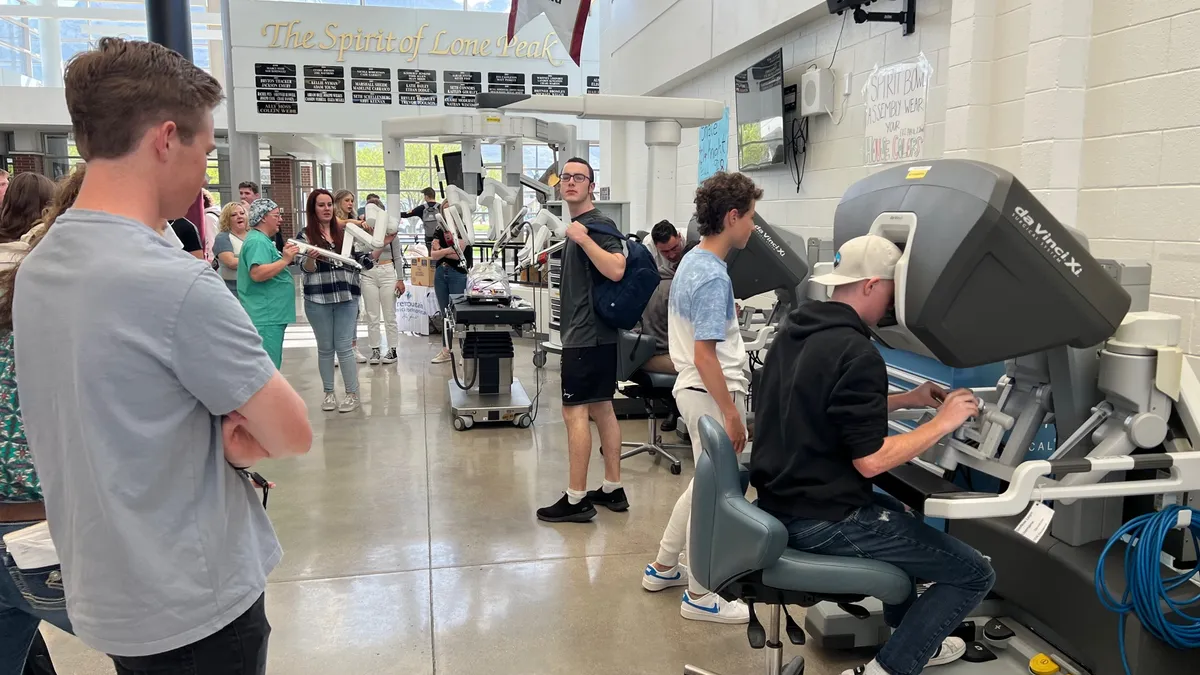 Students at Lone Peak High School in Utah got to learn how to use a surgical robotic device used at nearby American Fork Hospital.