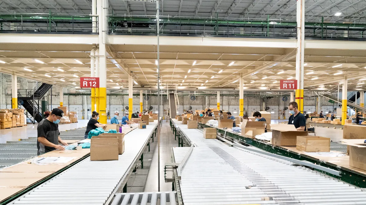 Employees work in a Gap distribution center in Fresno, California.