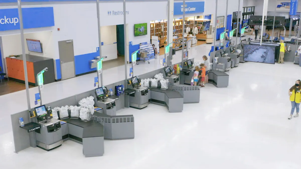 Open checkout area at Walmart supercenter in Fayetteville, Arkansas