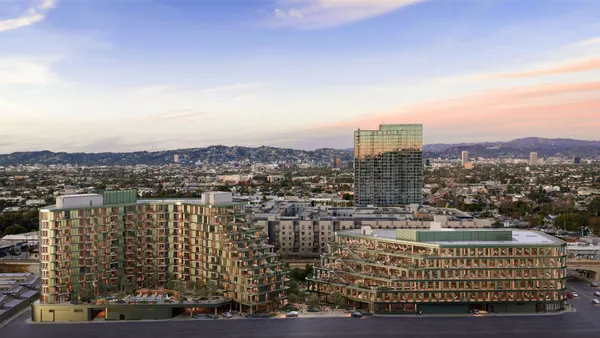 An aerial rendering of two semicircular buildings.