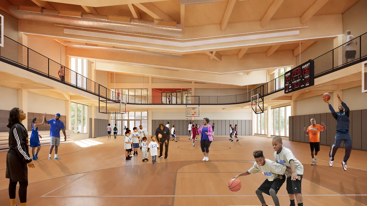 A rendering of people playing sports in a recreation center with basketball hoops and an upper level. The building is made of wood and has large windows with sunlight streaming through.