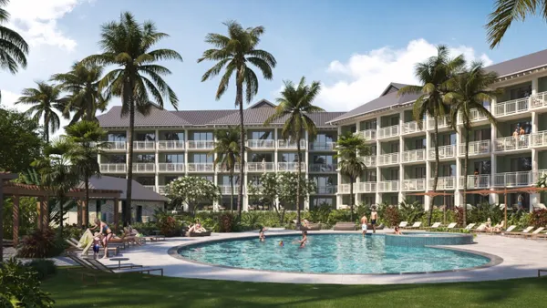 Rendering of a hotel pool surrounded by palm trees