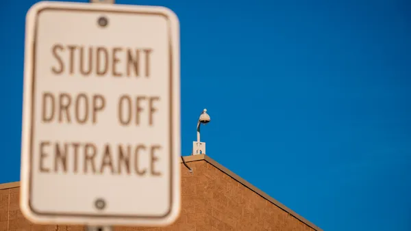 A security camera outside a K-12 school.