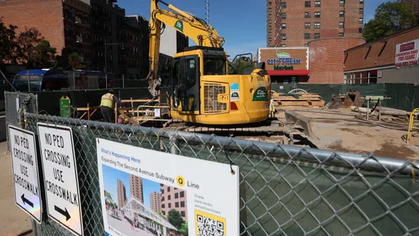 Workers are seen on the construction site of the Second Avenue Subway station