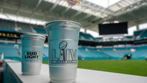 2 Ball aluminum cups branded for Bud Light and Super Bowl LIV against the backdrop of Hard Rock Stadium