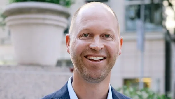 A headshot of Kirk Pederson.