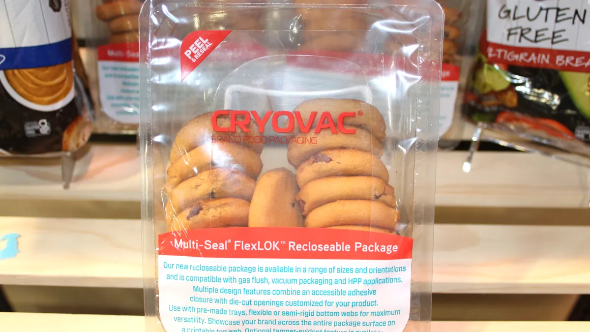 Cookies are housed in a clear plastic try with a reclosable plastic film cover.