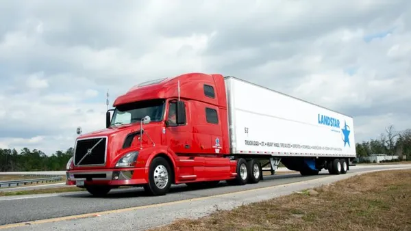 A freight truck n the road.