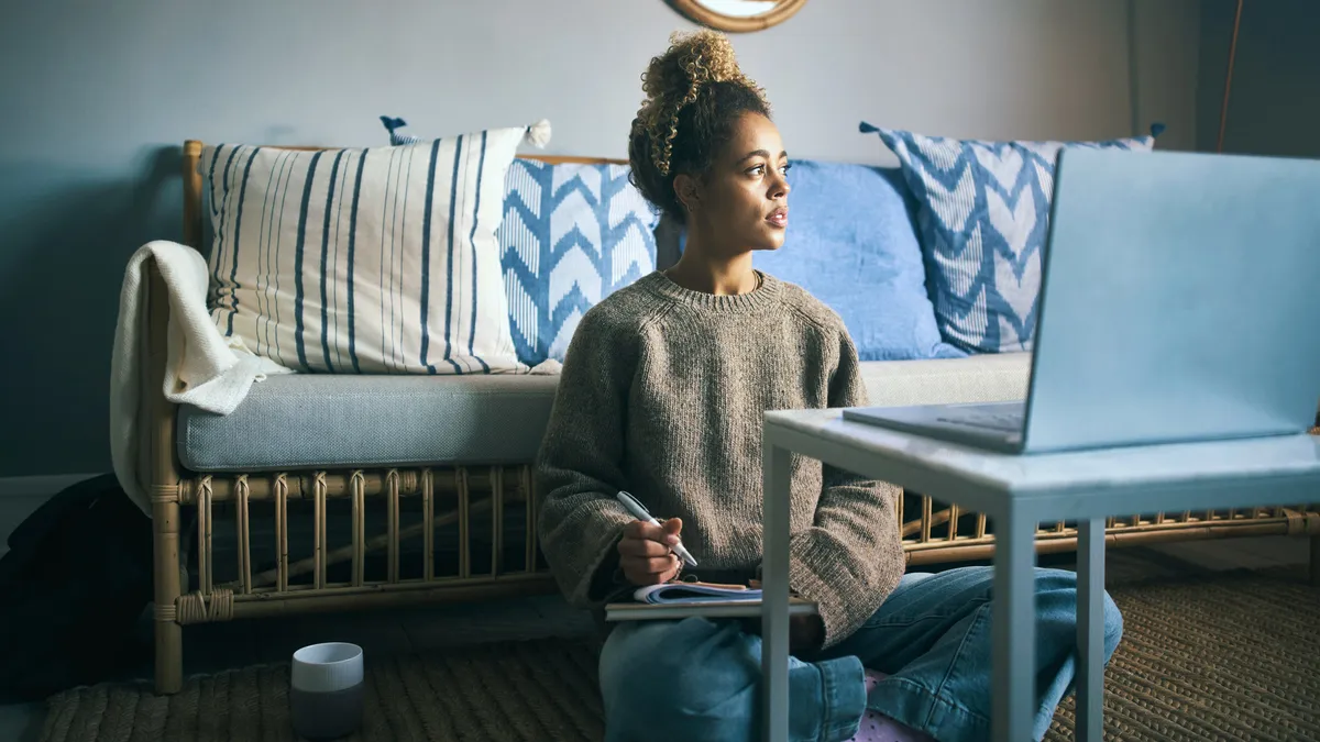 Woman working from home distracted