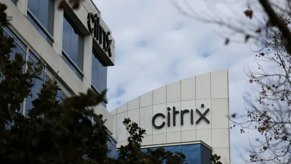 A sign is posted on the exterior of a Citrix office complex on January 31, 2022 in Santa Clara, California. Cloud-computing company Citrix announced plans to be acquired by Elliot and Vista Equity Partners in an all-cash deal valued at $16.5 billion.