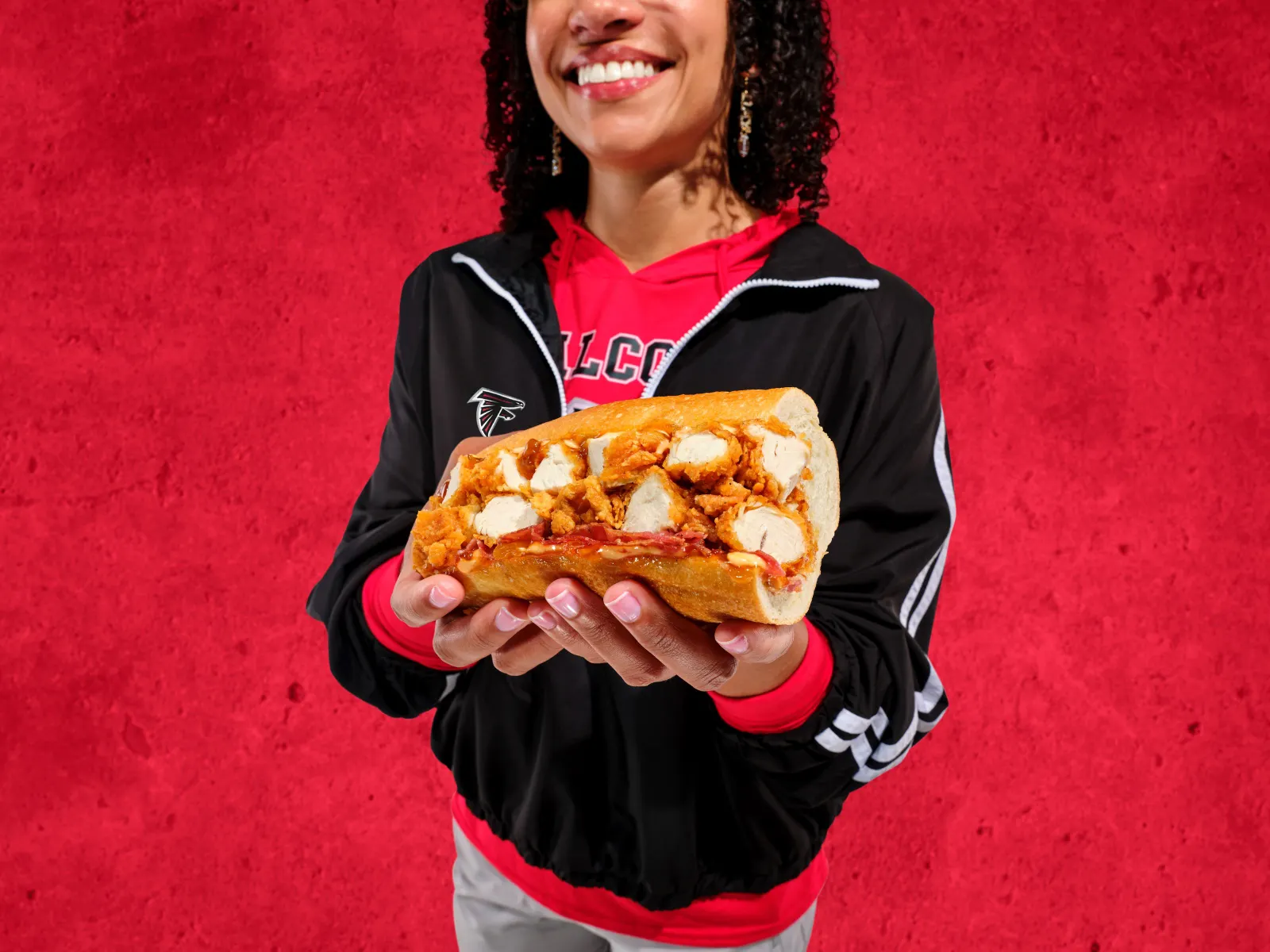 Someone holding a sandwich.