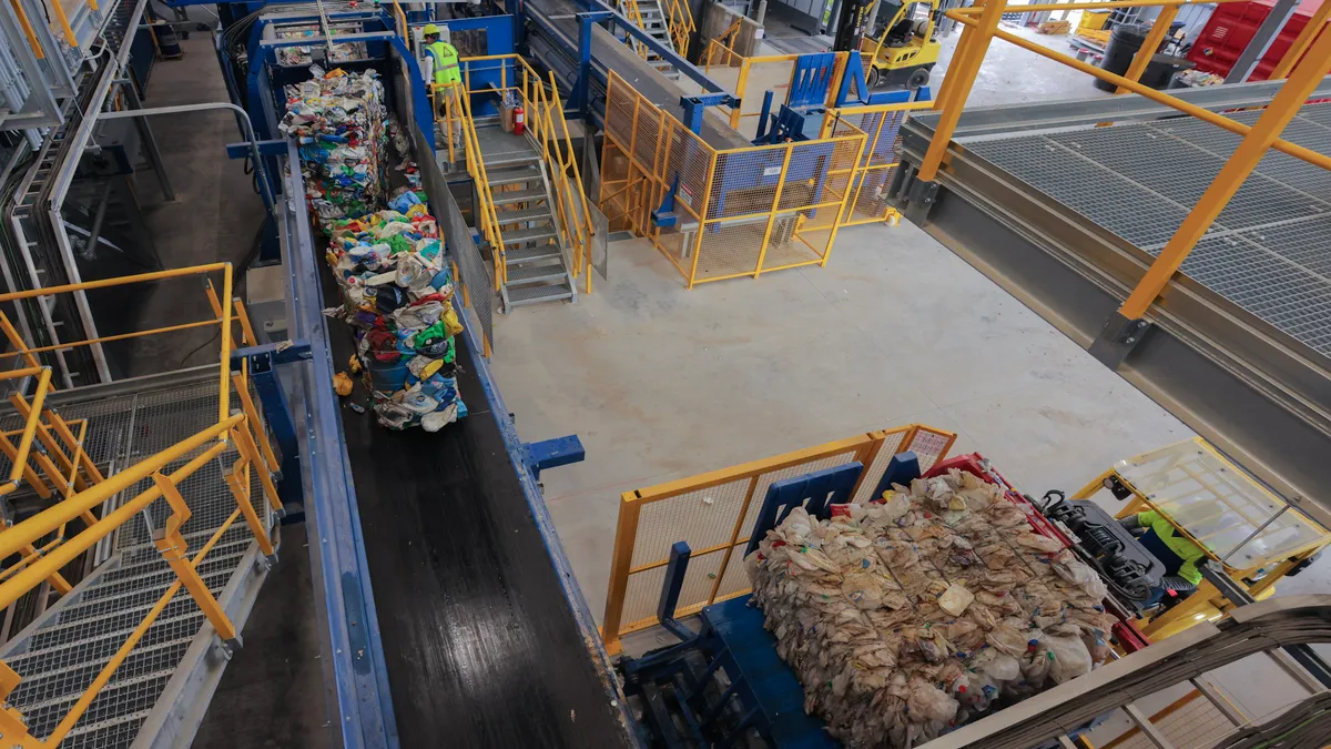 Bales of plastic go down a conveyor belt at Republic's Las Vegas Polymer Center