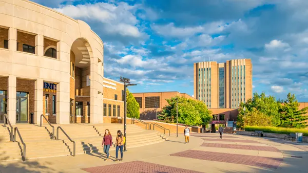 Students walk through Kent State University's campus.