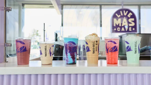 An image of several specialty drinks from Taco Bell's Live Mas Cafe lined up on a white counter top.