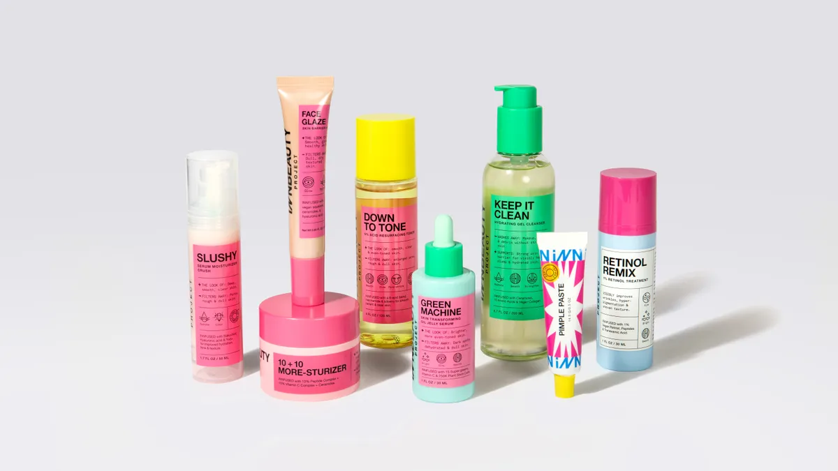 Pink and clear coated skincare bottles