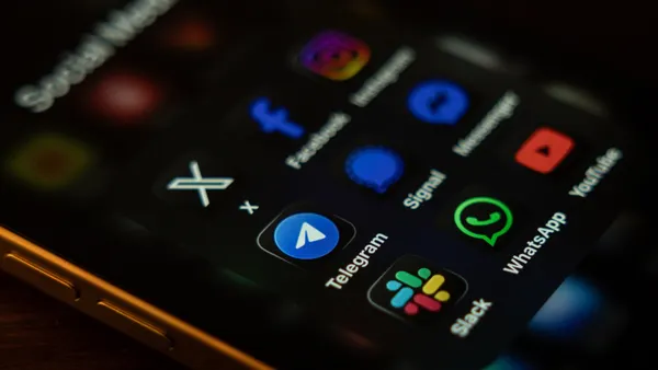 A smartphone screen displays several messaging apps