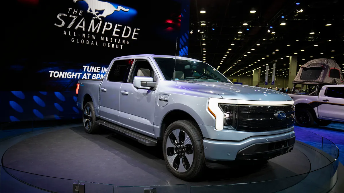 The Ford F-150 Lightning is displayed at the North America International Auto Show.