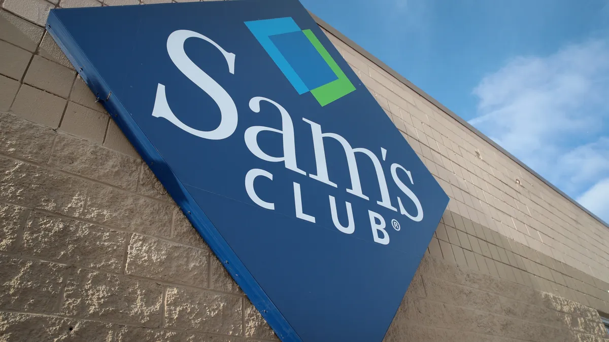 A sign hangs outside a Sam's Club store.