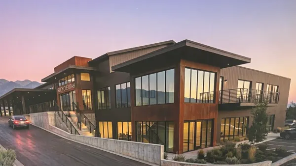 An artist rendering of the exterior of a recycling facility