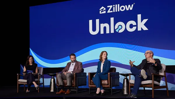Panel of speakers on stage
