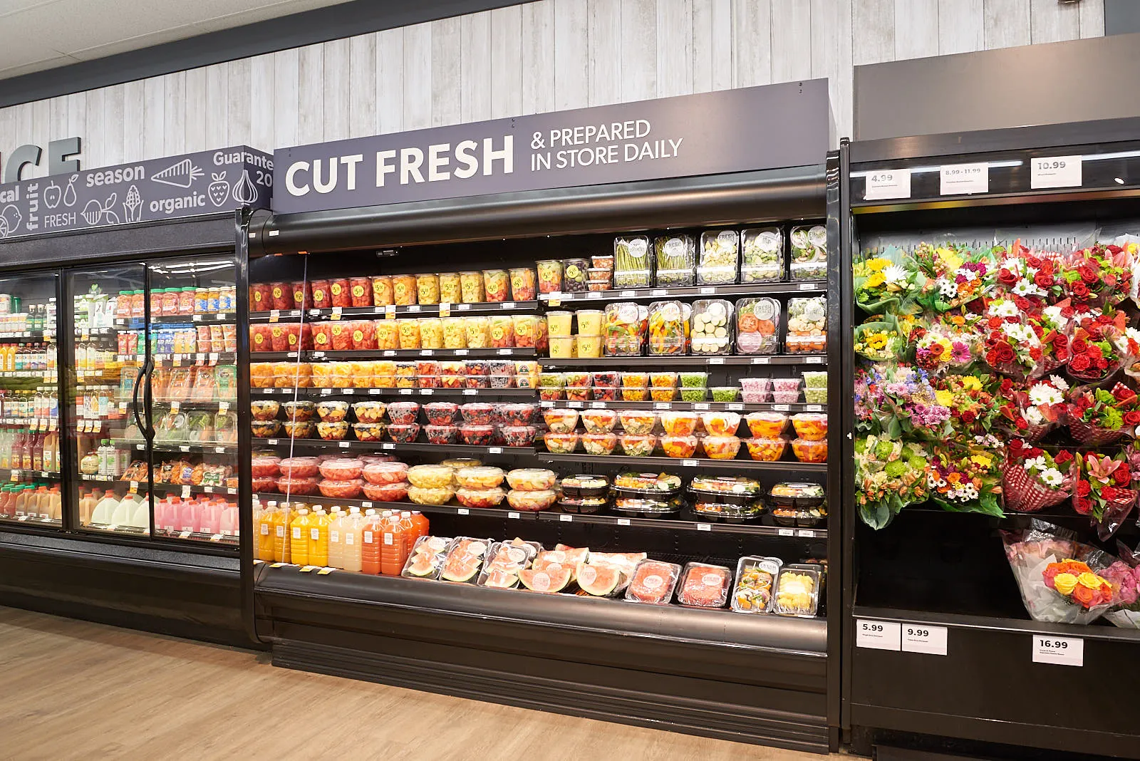 Freshly cut fruit packaged and displayed in grocery store