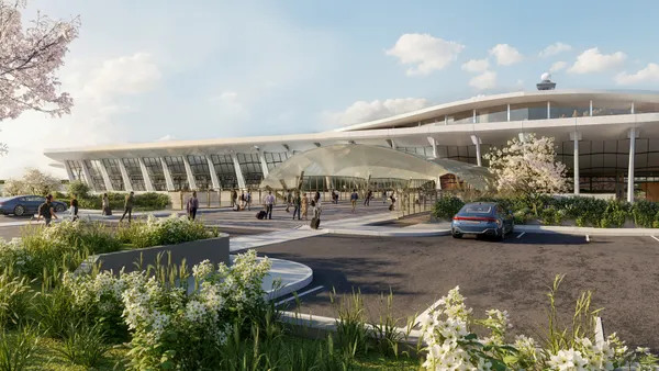 A rendering of a modern-looking building at sunrise. The glass outer covering is partially obscured by foliage.