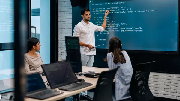 Software developer team working together